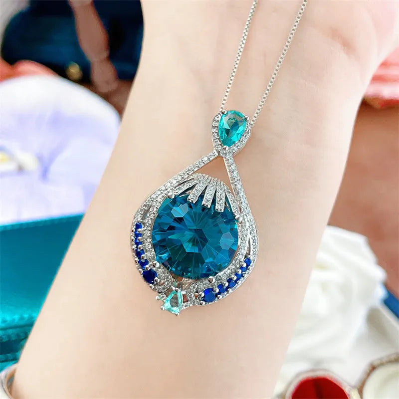 Blue fireworks cut crystal pendant necklace with water wave chain