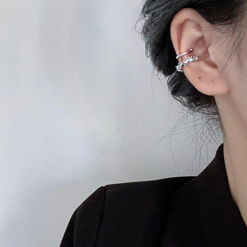 Geometric irregular shaped frosty finish alloy ear clip earrings with a double clip mechanism.
