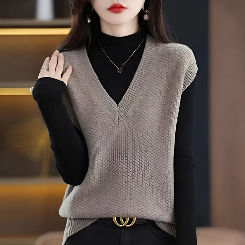Cashmere acrylic knitted sleeveless V-neck vest with a raised 3D pattern, shown in creamy-white colour.