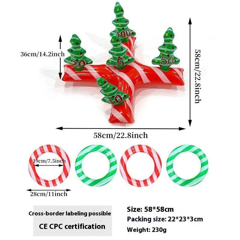Large red and white inflatable Christmas ball with snowflake design in garden setting
