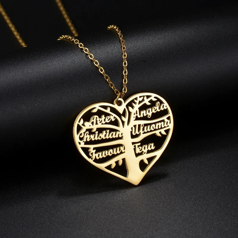 Custom silver necklace with hollow heart and life tree pendant engraved with names on a 50cm chain.