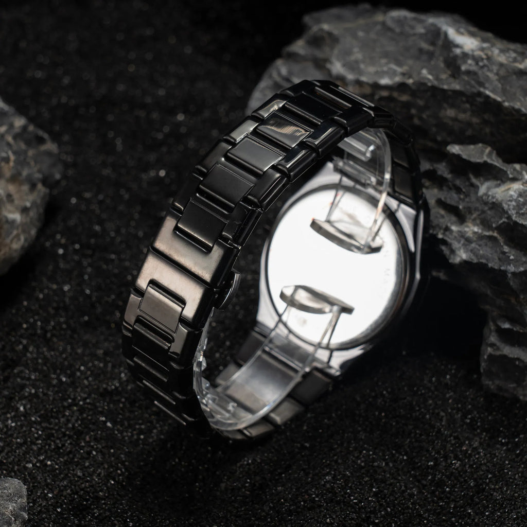 Men's stainless steel quartz watch with business casual design on a wrist, showing 10mm thickness