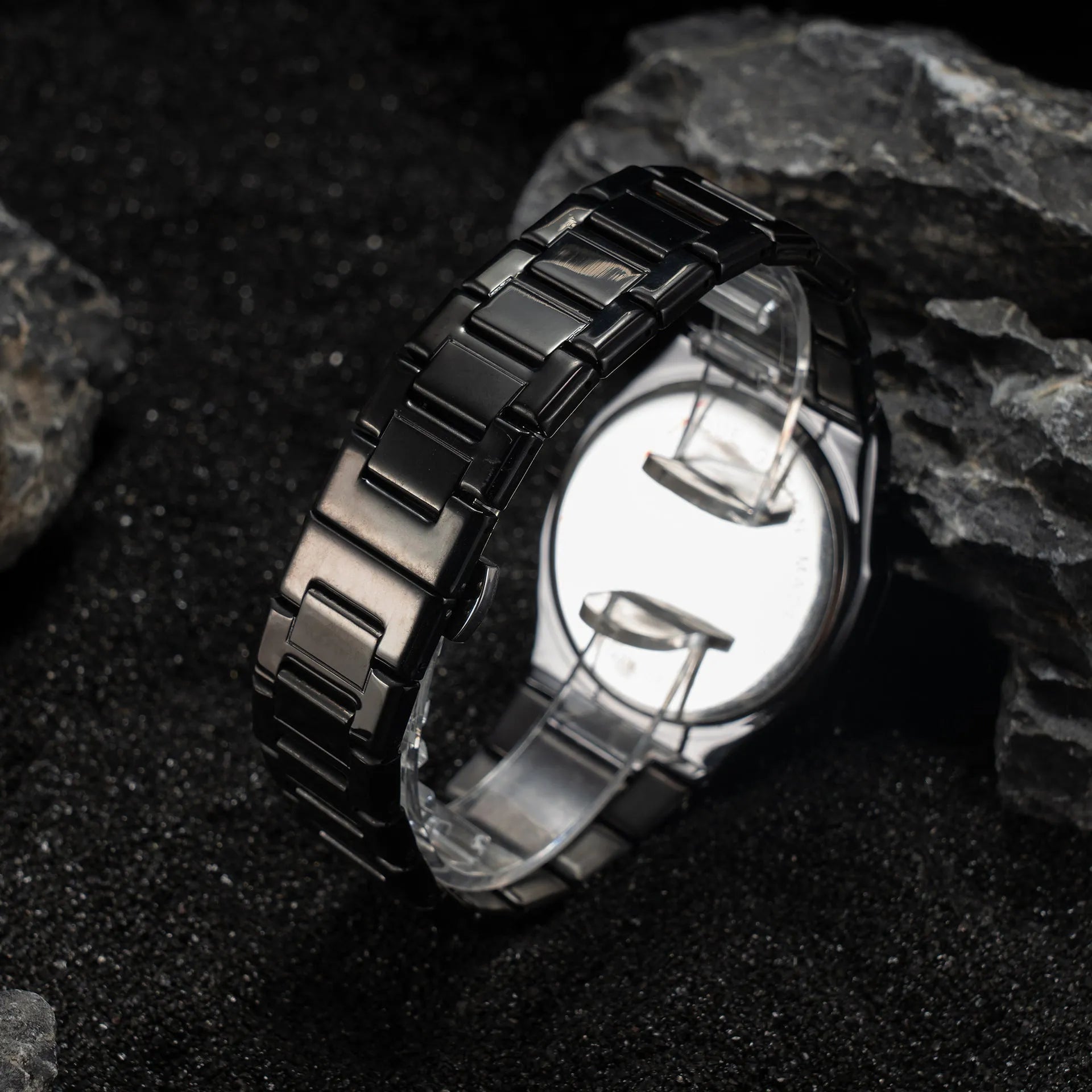 Men's stainless steel quartz watch with business casual design on a wrist, showing 10mm thickness