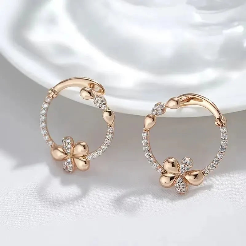 A pair of women's round copper hoop earrings with an electroplated finish in colour EK13286-FD-01.