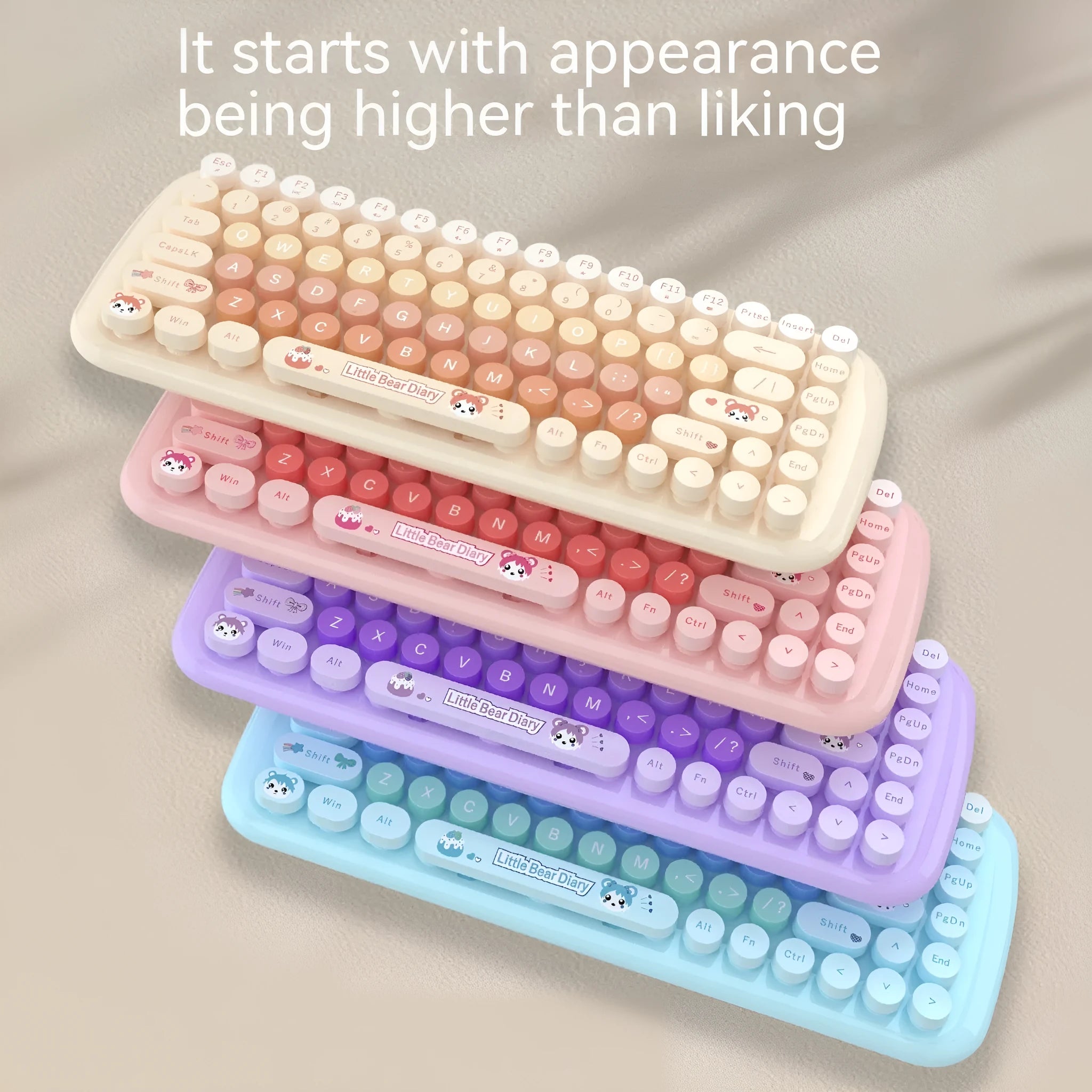 Candy pink wireless keyboard and mouse set with compact cartoon-style design on a desk.
