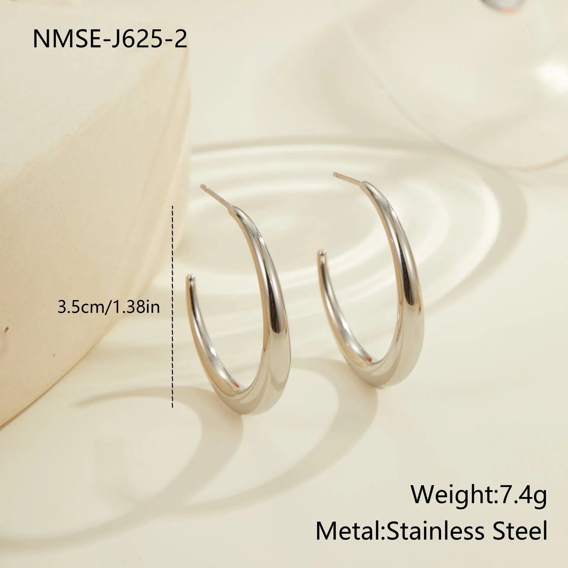 Titanium steel hoop earrings with 18K gold plating in small and large sizes