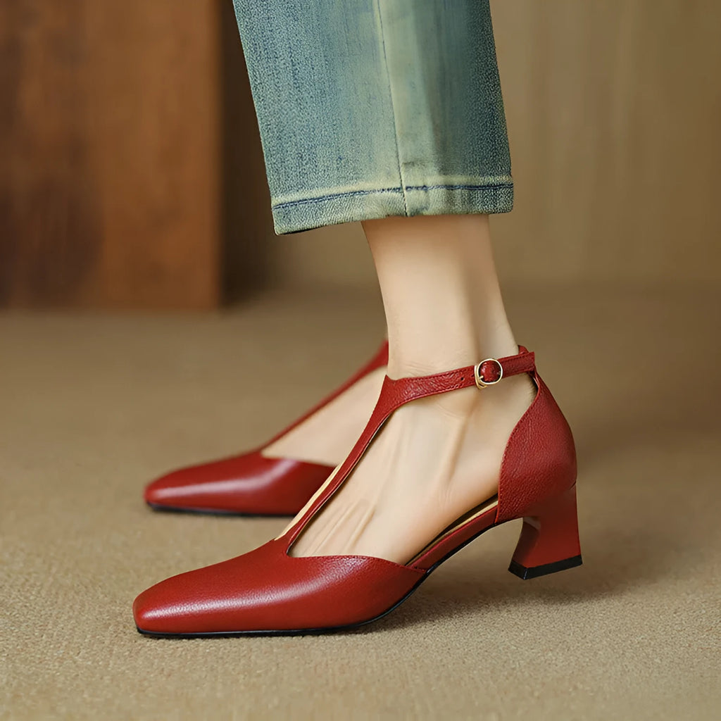 Wine red sheepskin leather shoes with square toe and chunky heel, showing buckle fastening