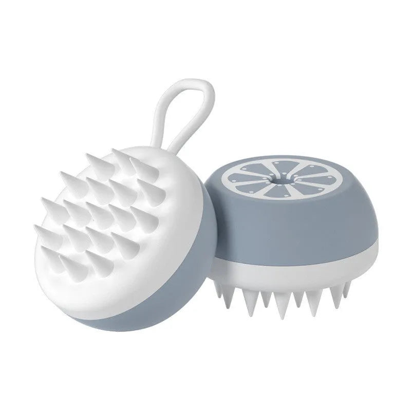 Pet grooming brush with 2-in-1 design showing massage head and comb teeth in soft silicone construction