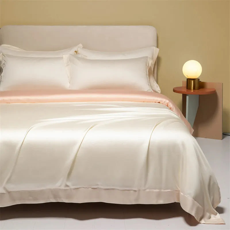 Lenzing Tencel 200 thread count bedding set in satin weave showing Aurora Blue quilt cover and pillowcases