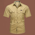 Men's loose fit cotton short sleeve work shirt in cardigan style on a hanger