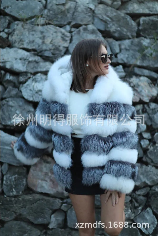 Women's loose brown artificial fur hooded coat on a hanger, street fashion style.
