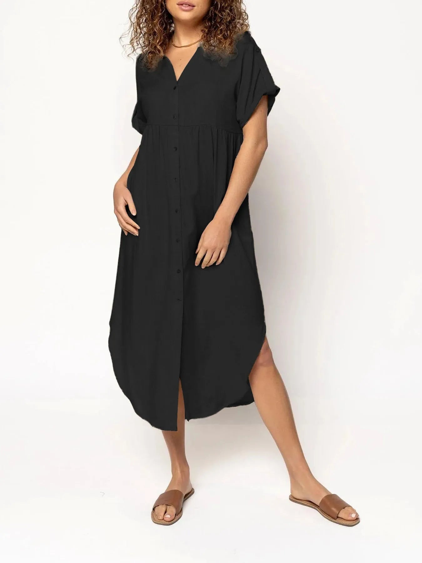 Women's loose-fit mid-length casual dress with button front in a solid colour.