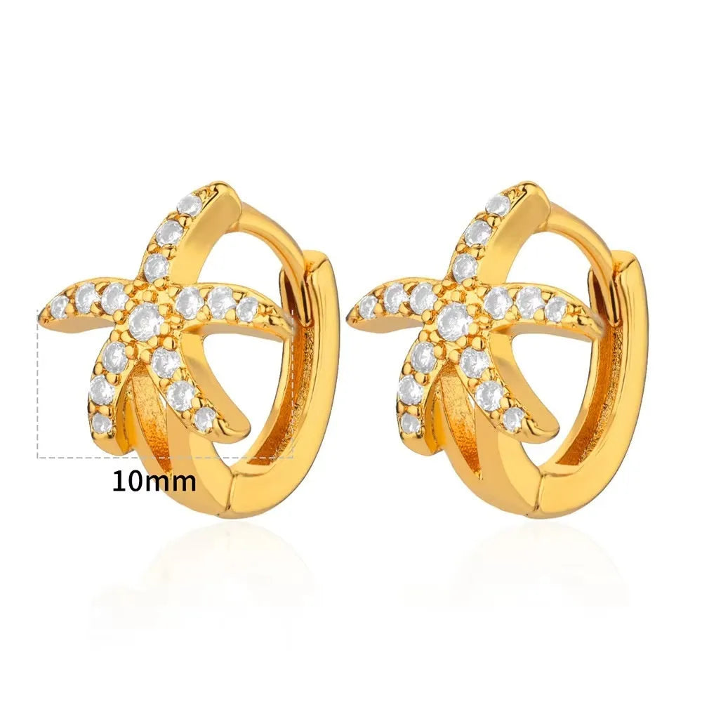 Geometric butterfly earrings for women in copper alloy with heart, bow, and star shapes.