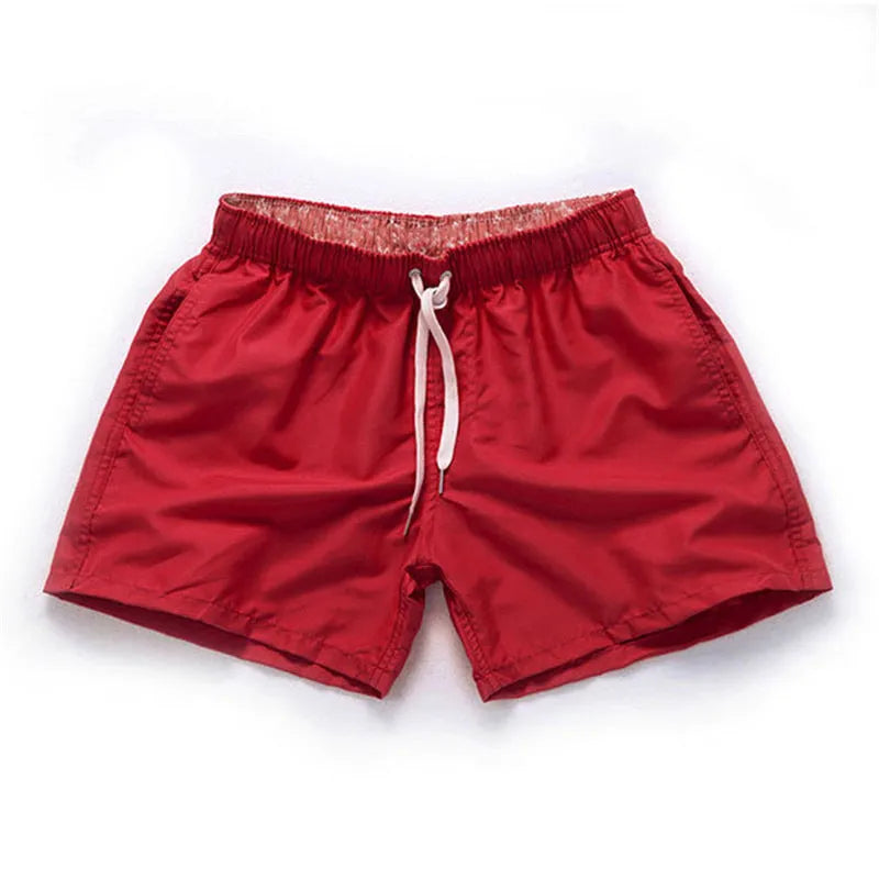 Men's straight-leg beach shorts in polyester fabric, shown in multiple colours and plus sizes.