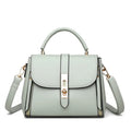 Women's soft leather shoulder bag in messenger style with adjustable strap