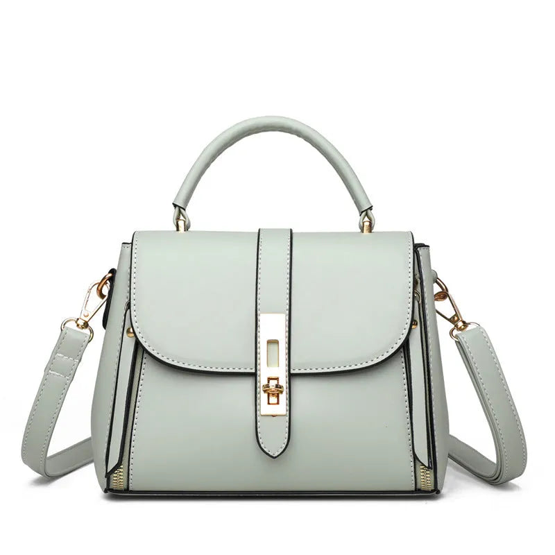 Women's soft leather shoulder bag in messenger style with adjustable strap