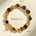 Natural yellow 10mm artificial crystal bead bracelet with an adjustable string tie.