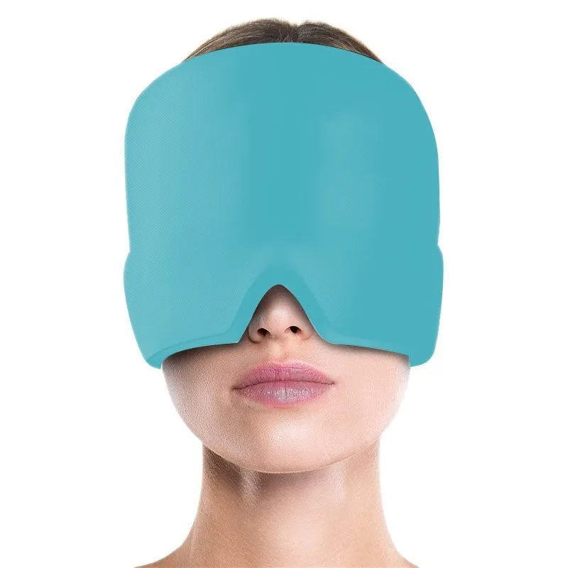 Black elastic cloth gel cold therapy eye mask for headache relief on grey background.