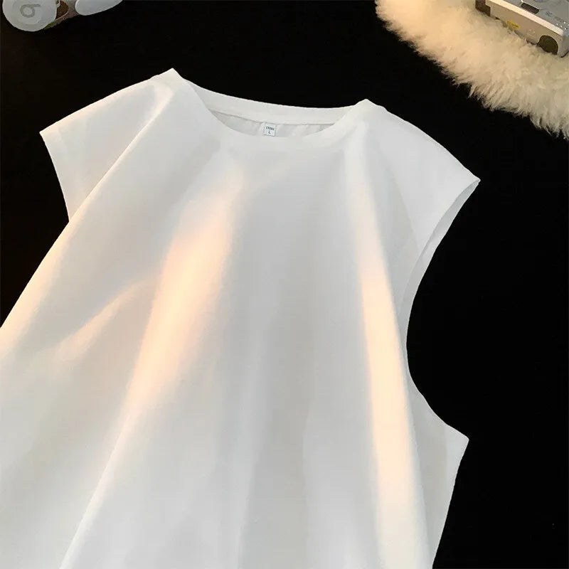 Men's loose cotton tank top in solid colours showing sleeveless design and straight hem