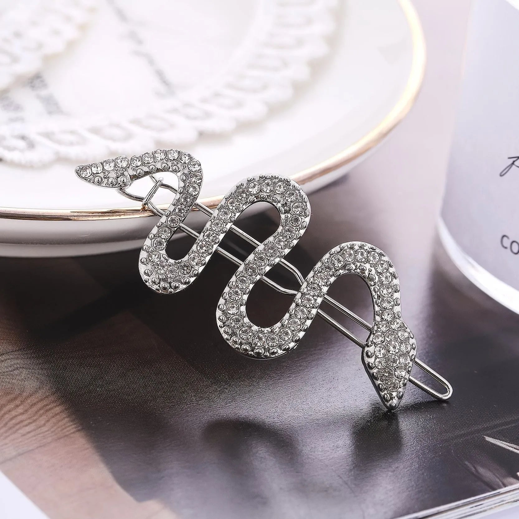 Gold and silver vintage snake hair barrettes with rhinestone detailing on alloy clips.