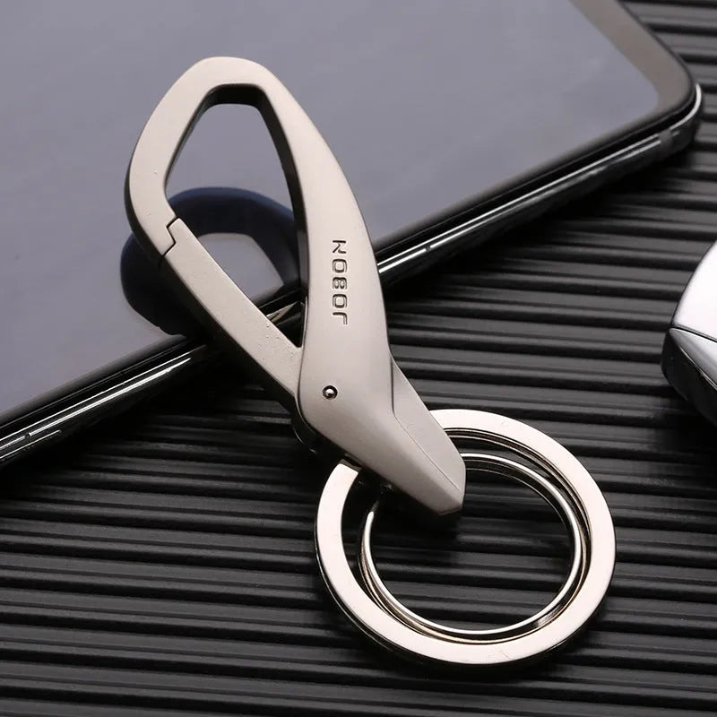 Zinc alloy car key chain with double rings, measuring 8.3x3.5cm in black, chrome, and nickel colours