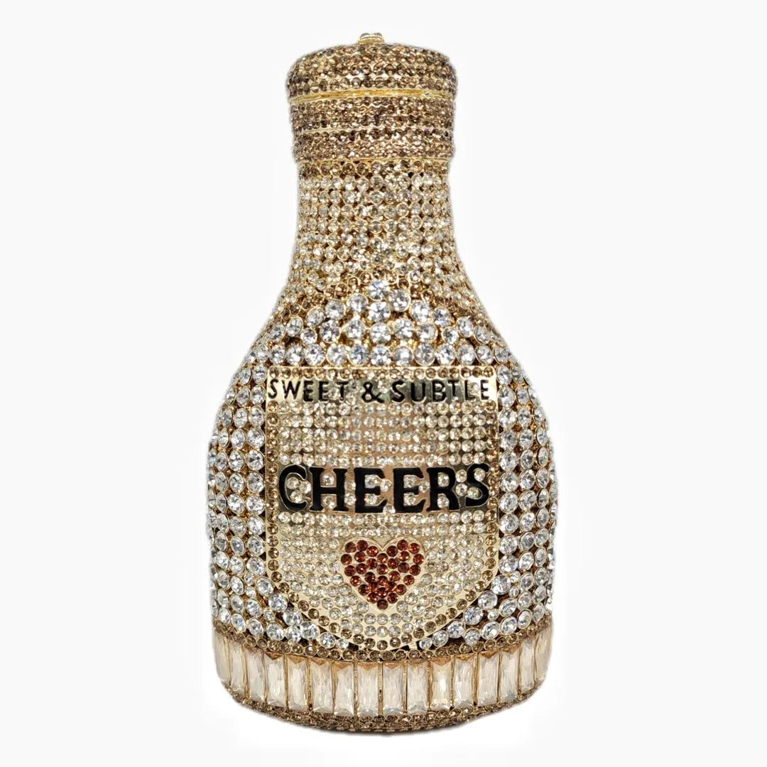 Gold champagne bottle shaped evening clutch with alloy frame measuring 20cm tall