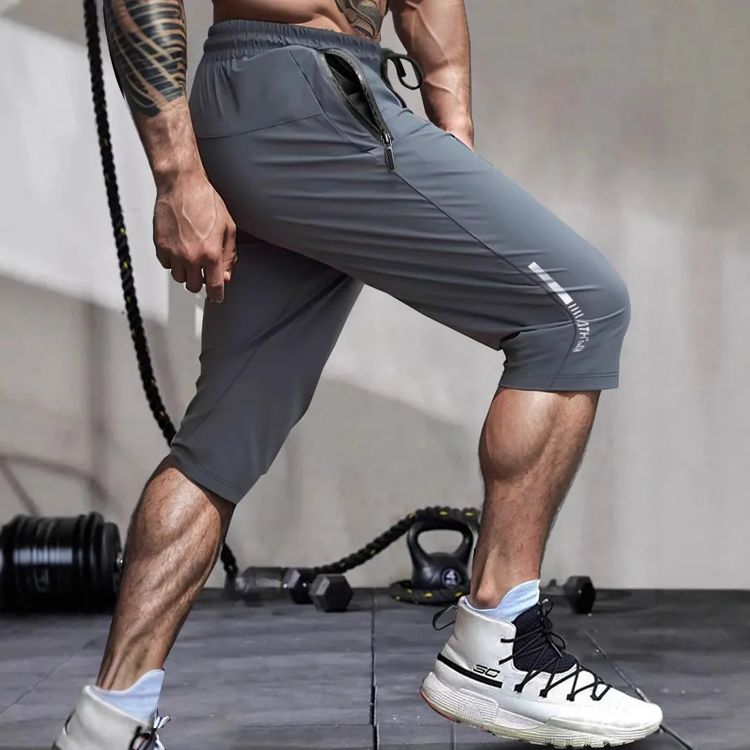 Men's cropped ice silk sports casual pants in nylon fabric with straight-leg cut