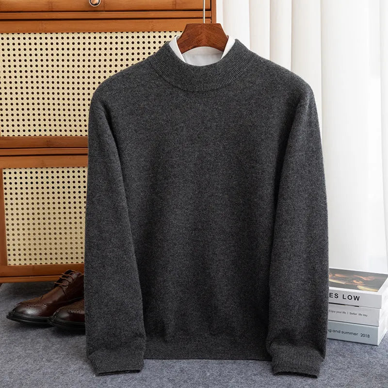 Men's loose fit half-turtleneck wool sweater in a neutral colour on a hanger.