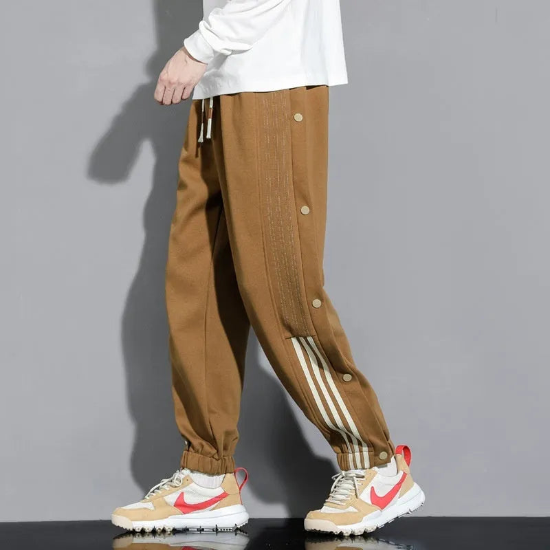 Men's loose-fit sportswear trousers with ankle tie detail in cotton blend fabric