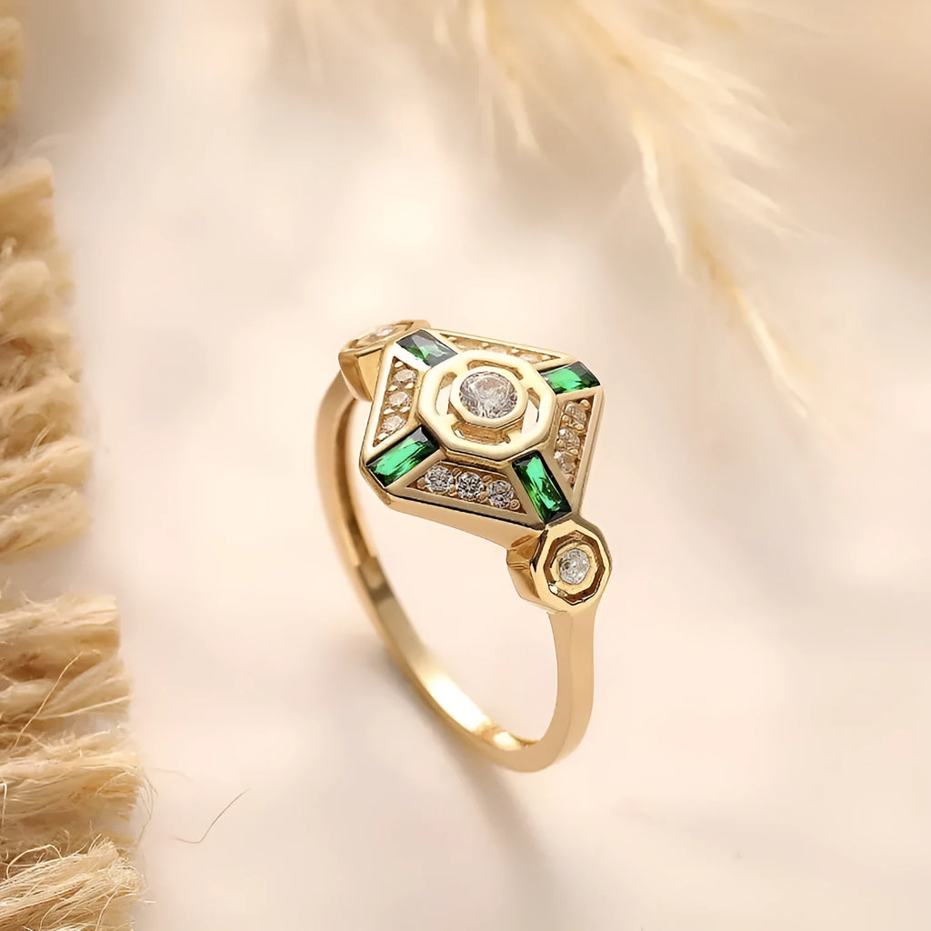 A square-cut Ins style emerald diamond ring for women on a white background.