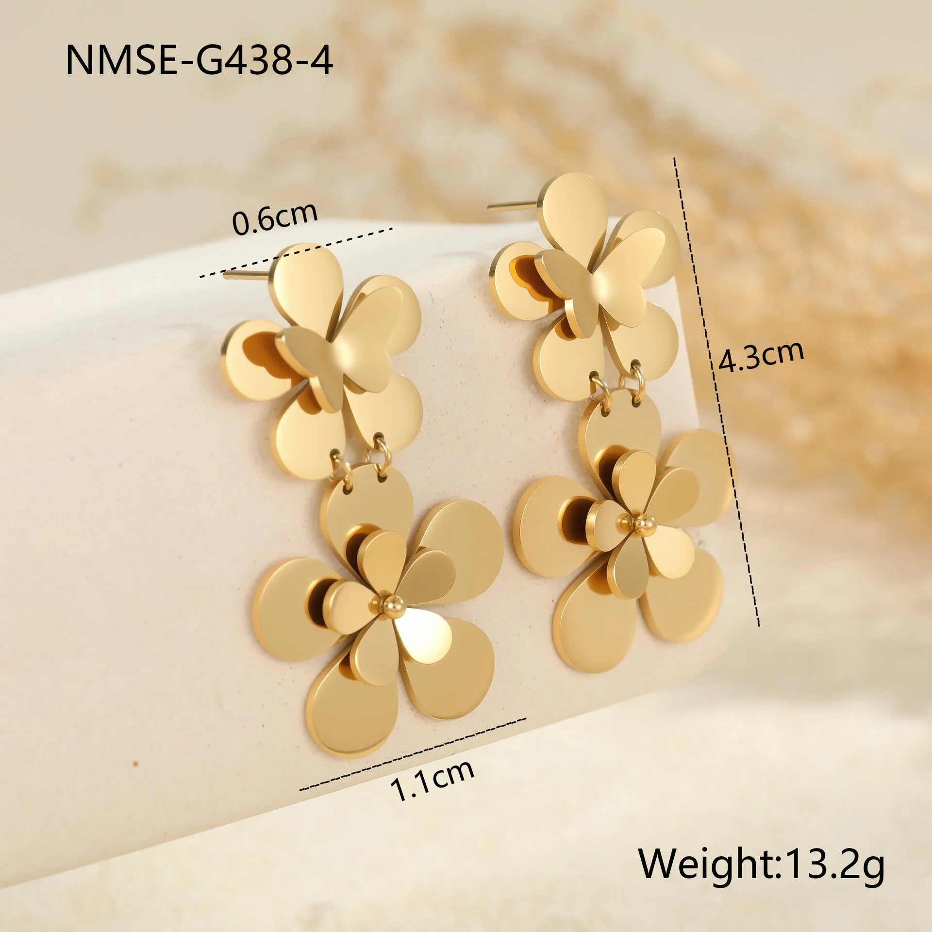 Gold electroplated stainless steel flower butterfly earrings for women with geometric zodiac design