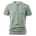 Men's solid colour slub cotton short sleeve T-shirt on a hanger, showing classic British style.