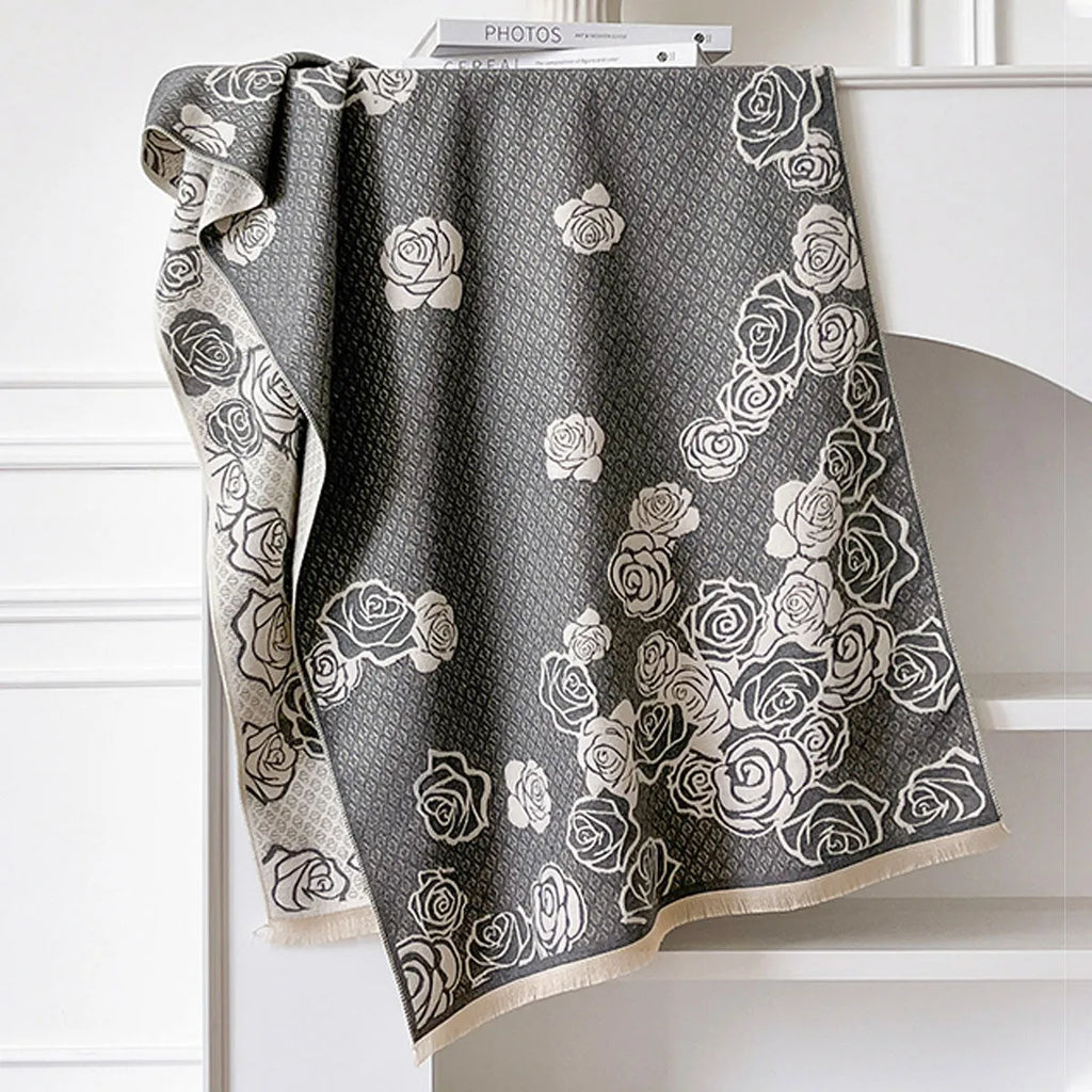 Long grey imitation cashmere scarf with tassels laid flat to show 185cm length.