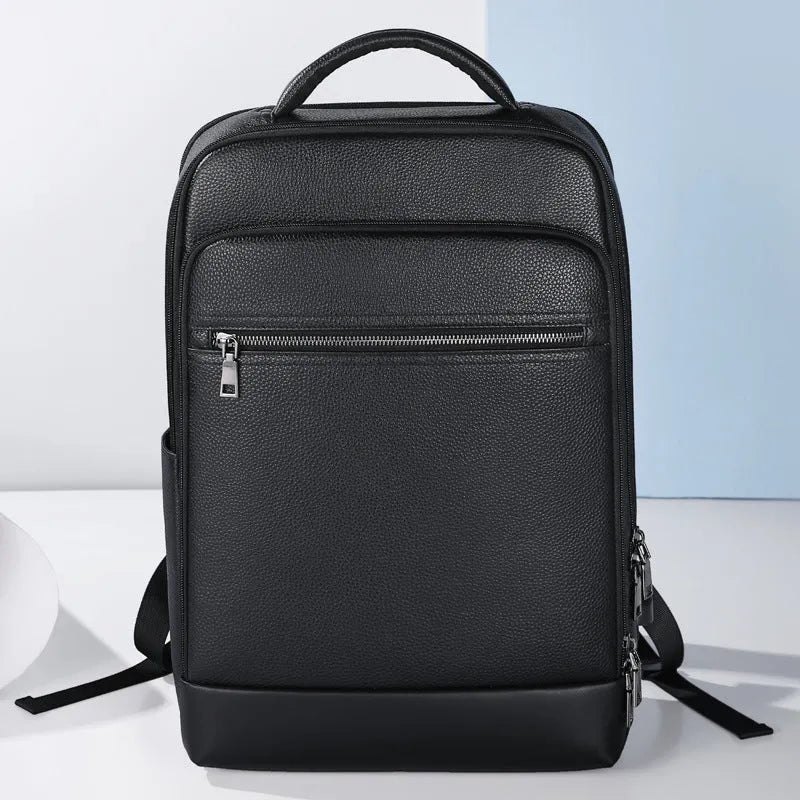 Black men's leather business backpack with curved shoulder straps and sewing line detailing