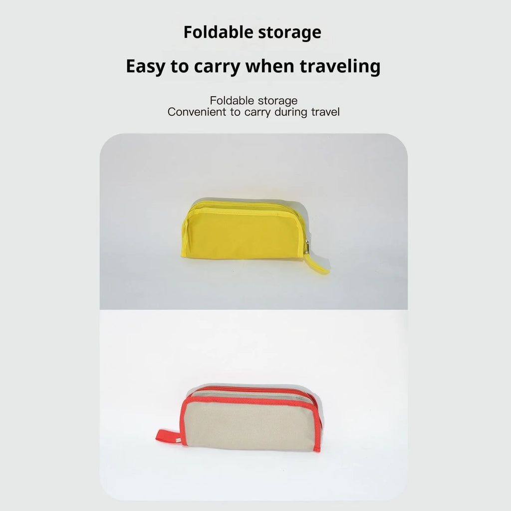 A folded lightweight camp stool in oxford cloth, shown in one of six available colours: black, blue, green, khaki, khaki red, or yellow.