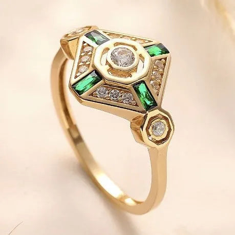 A square-cut Ins style emerald diamond ring for women on a white background.