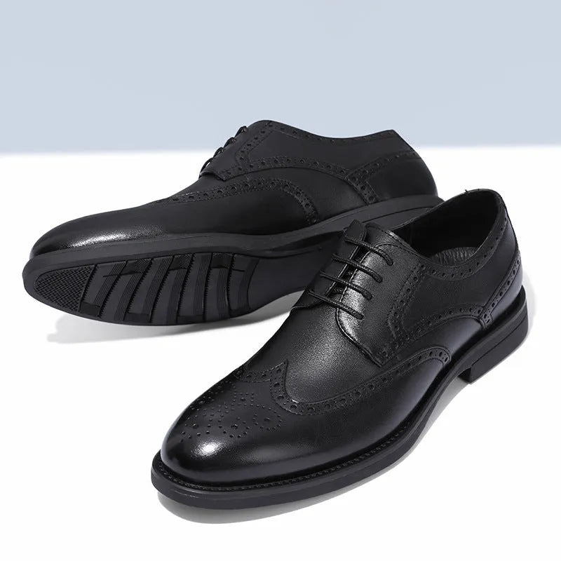 Men's black brogue leather shoes with traditional perforated detailing and lace-up design