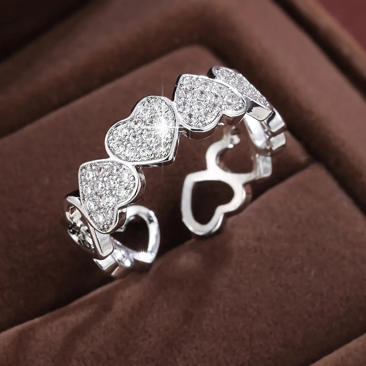 Geometric love heart couples ring with adjustable opening in gold and silver colours