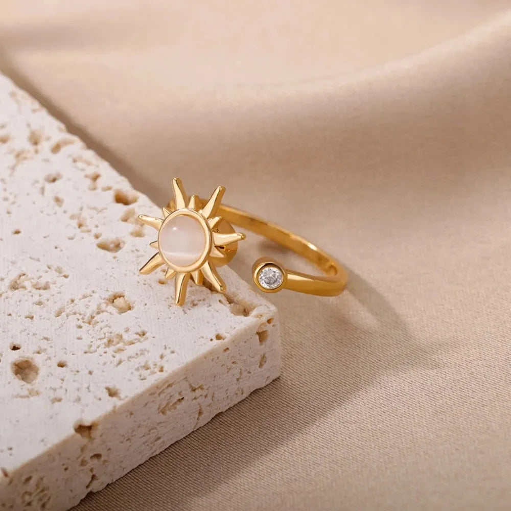 Simple geometric copper decompression ring with adjustable opening in gold colour.