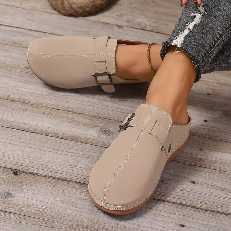 Women's casual wedge slippers in various colours with closed toe design and rubber sole
