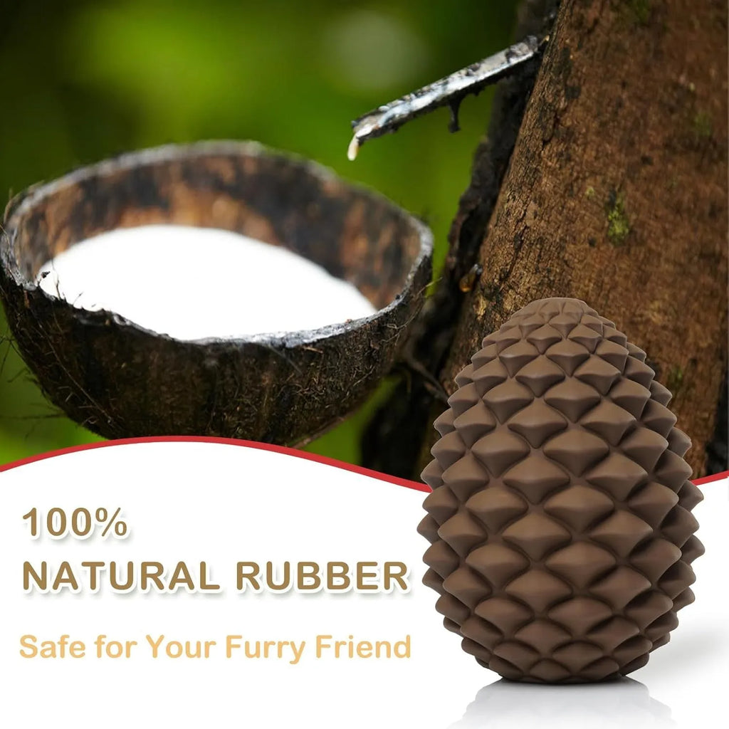 Yellow pine cone shaped natural rubber dog chew toy with textured surface and treat dispensing opening