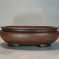 Purple clay handmade desktop flowerpot measuring 58x47x18cm with classical ceramic design