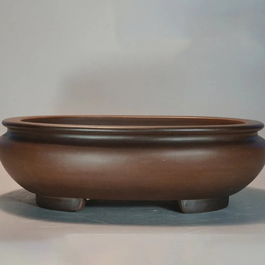 Purple clay handmade desktop flowerpot measuring 58x47x18cm with classical ceramic design