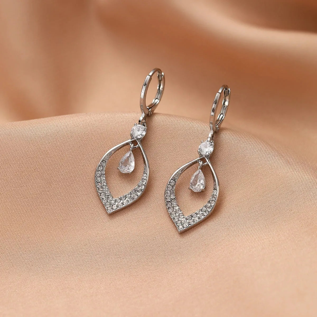 Zircon water drop tassel earrings in gold or silver with teardrop design and electroplated copper construction