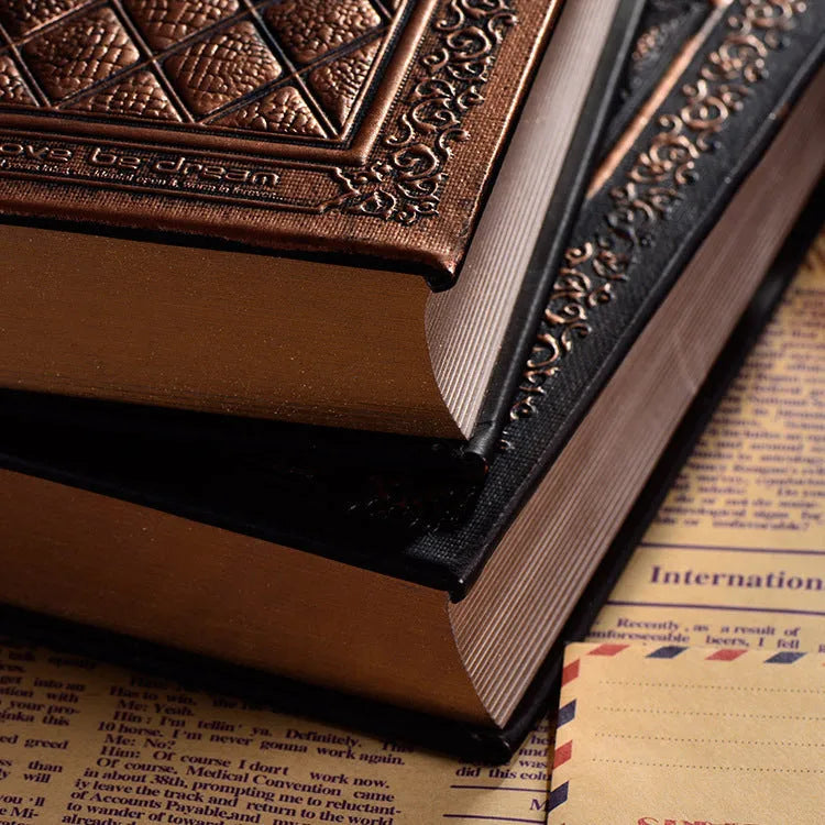A5 embossed faux leather notebook with a thick cover in bronze or black gold colour.