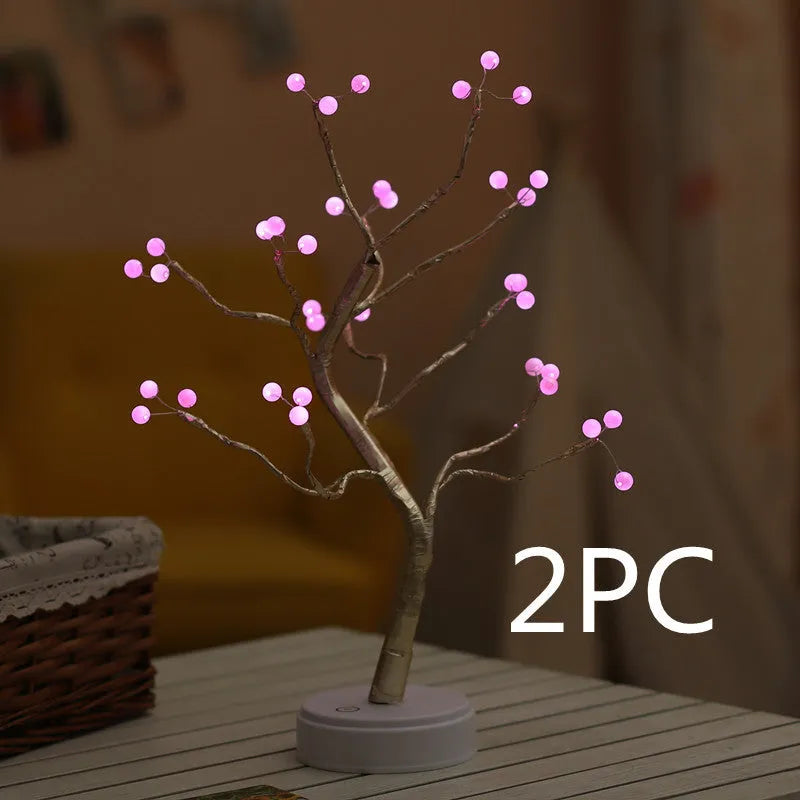 White LED Christmas tree shaped night light with touch base, standing 50cm tall on a table.