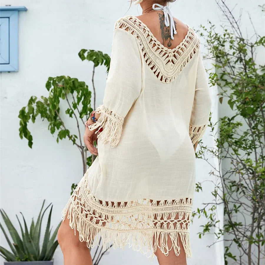 Apricot coloured women's crocheted knitted patchwork beach dress with mid-length skirt and half sleeves
