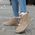 Unisex waterproof snow boots with fleece lining and non-slip rubber soles in black colour