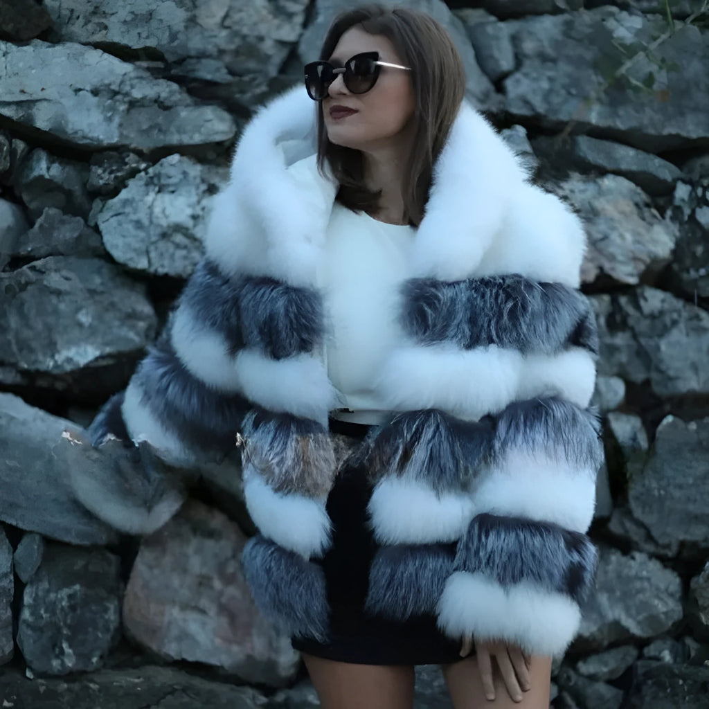 Women's loose brown artificial fur hooded coat on a hanger, street fashion style.