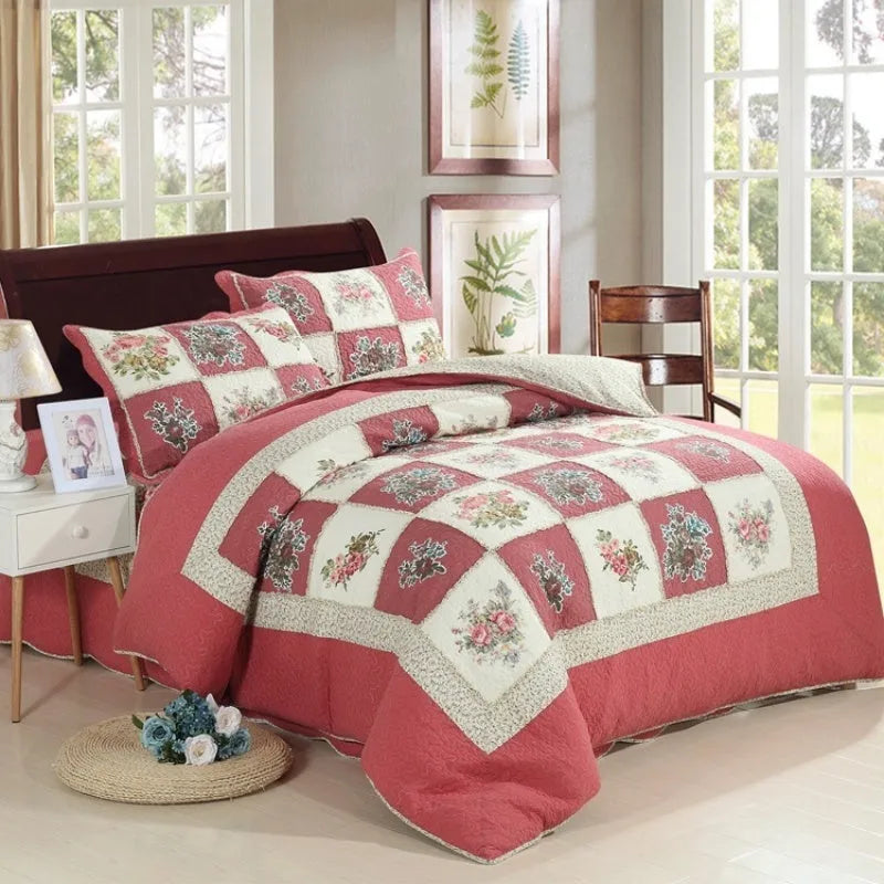 Pure cotton quilted bedspread three-piece set in washed fabric with pillowcases on a bed.